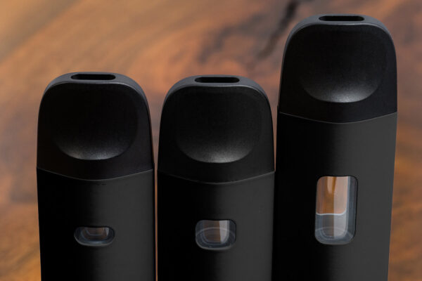 close up of three unbranded O2vape traveler extreme glass CFB units side by side.