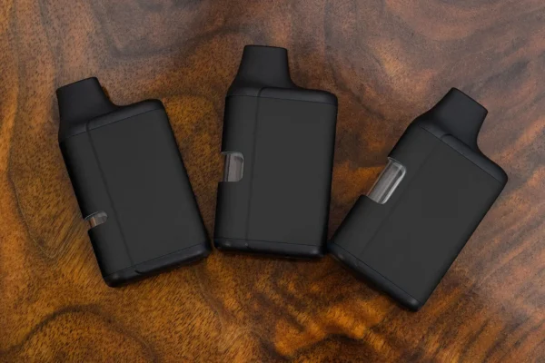 three unbranded O2vape traveler extreme glass nano units fanned out.